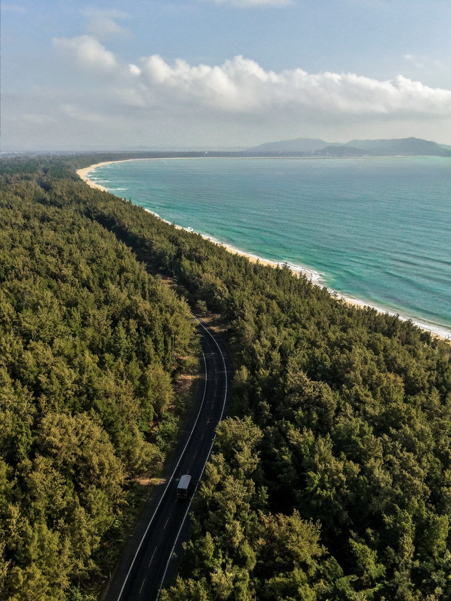 Coastal road along a Hainan beach, from the air